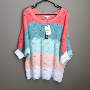 Sweater.   Tribal Jeans brand. Tags on. Never worn.  Size L/XL.